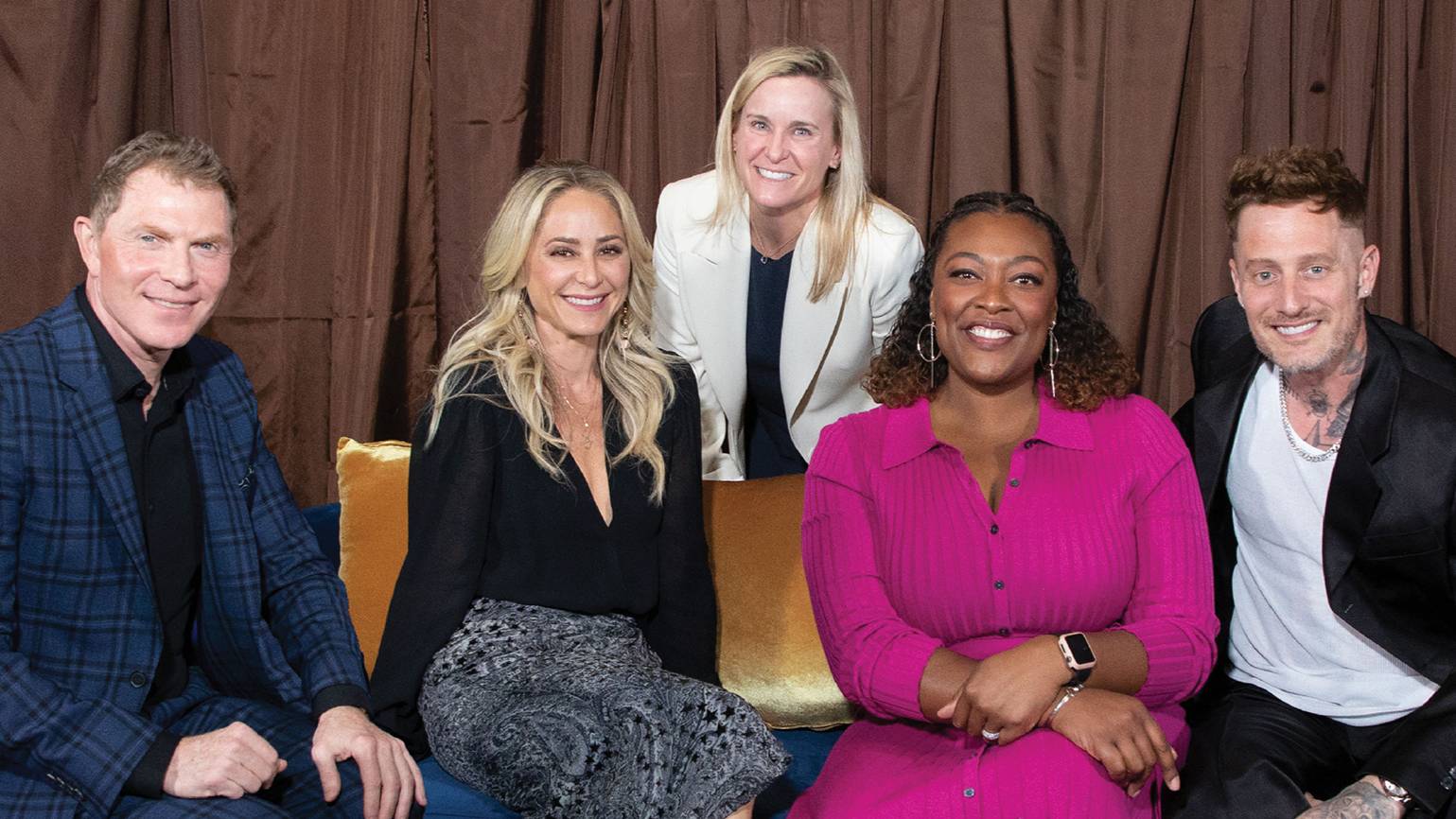 Betsey Ayala with group photo with Bobby Flay