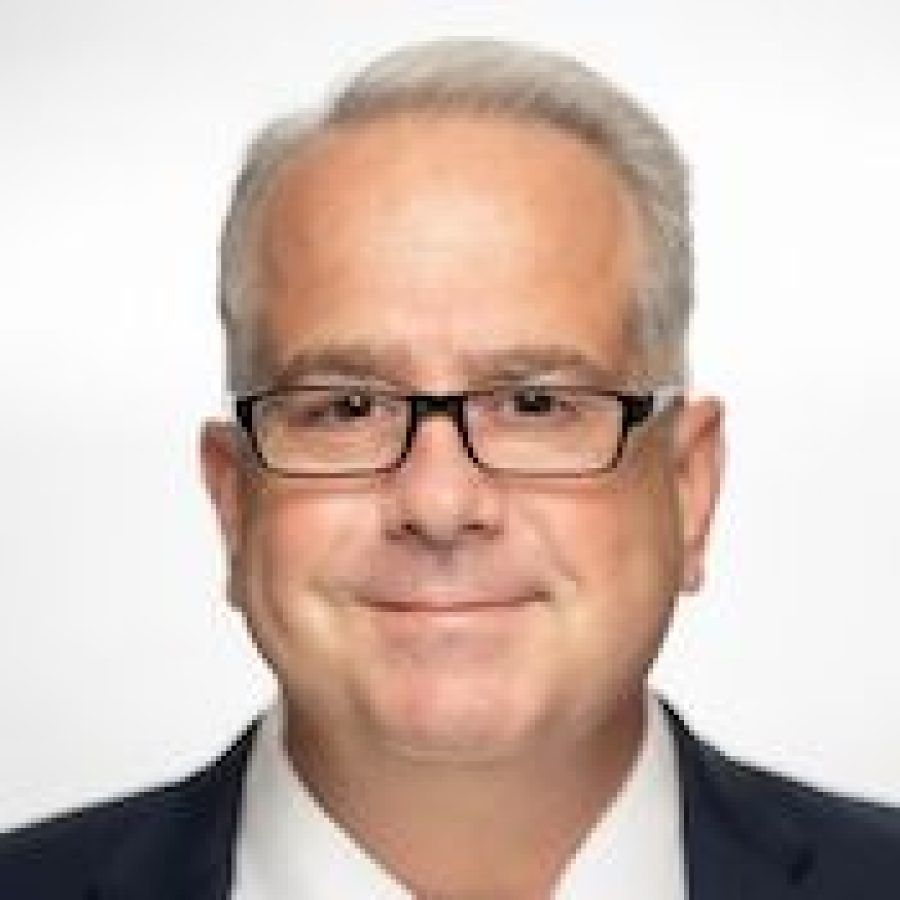 A headshot of John A. McLean